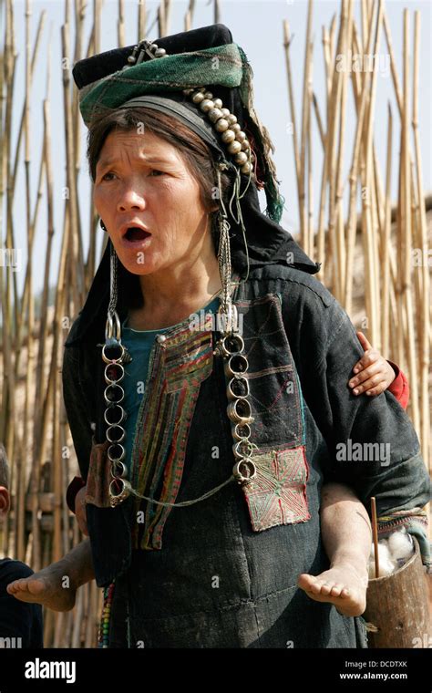 Portrait Of Ethnic Akha Woman In Tribal Village Near Phongsali Laos