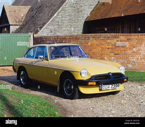 Mg Mgb Gt 1976 Rubber Bumper Model In Countryside Cottage Setting