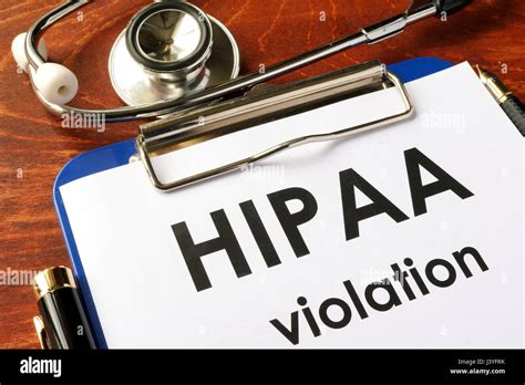 Hipaa Violation Form On A Clipboard Medical Confidentiality Concept