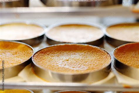 Cake shapes. Confectionery. Cakes production. Roasting pans in trolley ...