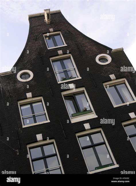 Canal house in Amsterdam Stock Photo - Alamy