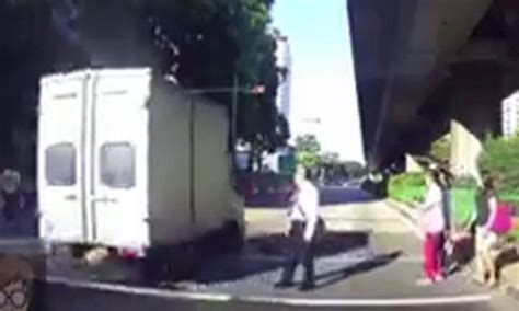 Lorry Runs Red Light Barely Misses Pedestrians Crossing Road