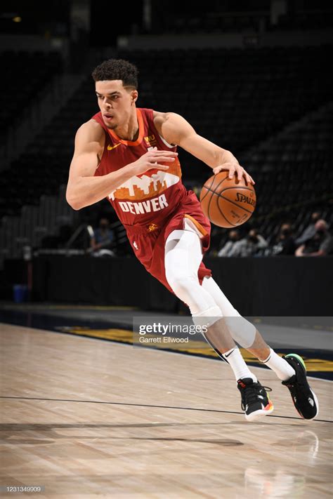 Michael Porter Jr 1 Of The Denver Nuggets Dribbles During The Game