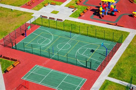 Children backyard Playground. Basketball court, children's slides Stock ...