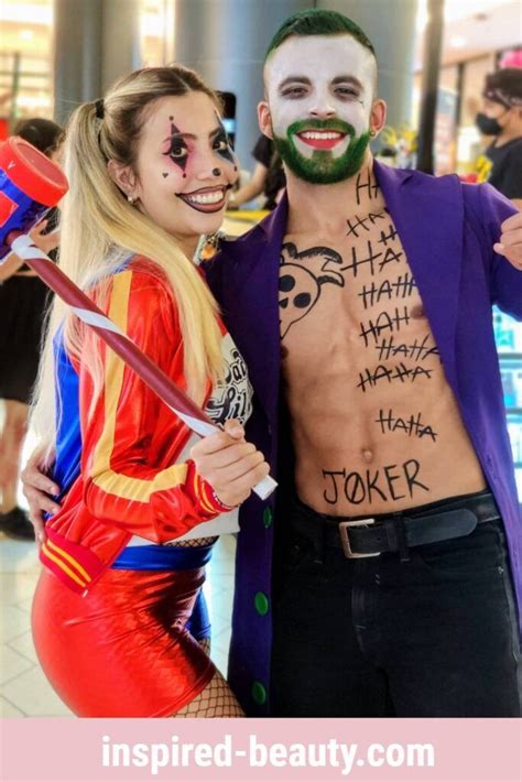 Two People Dressed Up As Joker And Harley