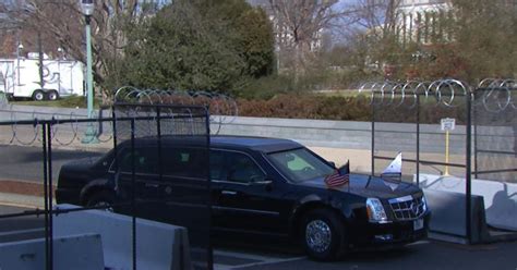 Bidens Motorcade Passes Security Gates And Razor Wire Fencing In