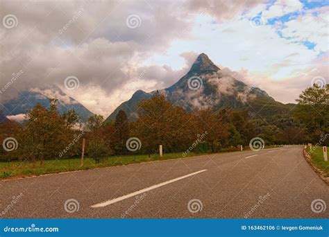 Astonishing Autumn View Of Mountain Shrouded In Fog Valley With