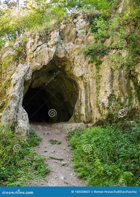 Dark rocky cave entrance stock image. Image of hiking - 100328837