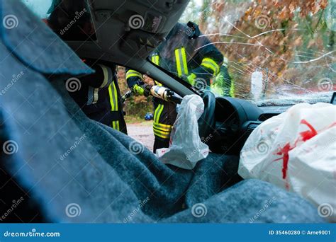 Car Accident - Victims In Crashed Vehicle Receiving First Aid Stock ...