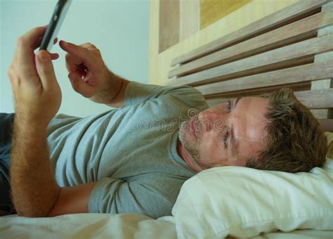 Lifestyle Indoors Portrait Of Young Happy And Attractive Man At Home