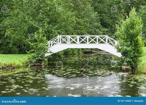 Decorative White Wooden Bridge Over Small Pond In Park Stock Photo ...