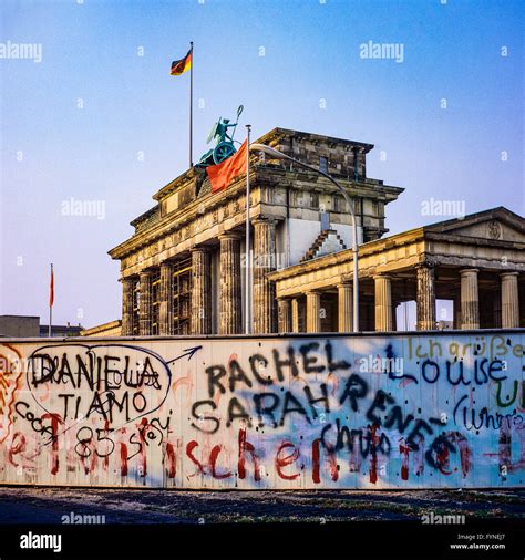 August 1986, graffitis on the Berlin Wall and Brandenburg Gate in East Berlin, West Berlin side ...