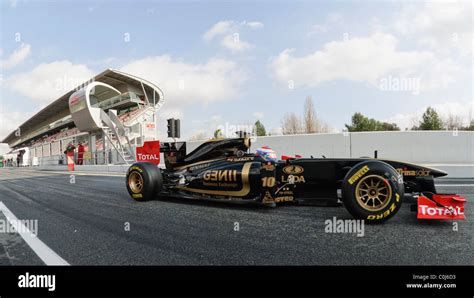 Vitaly Petrov Rus In The Renault R Formula One Racecar In Front Of