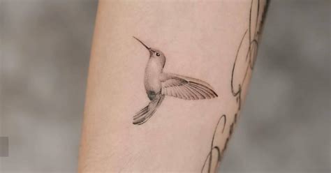 Micro Realistic Style Hummingbird Tattoo Done On The