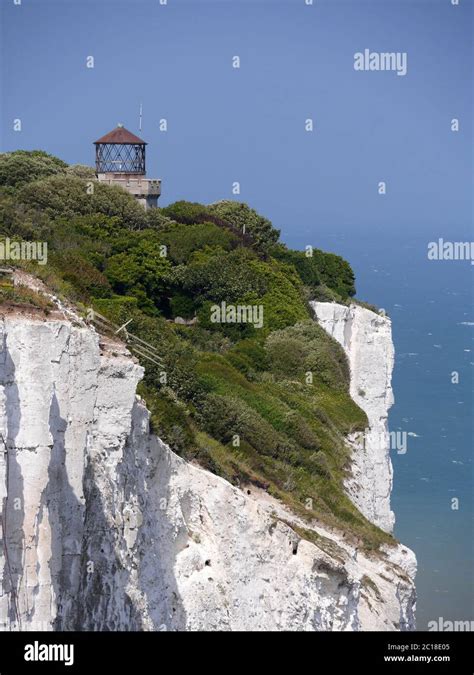 White Cliffs of Dover with lighthouse Stock Photo - Alamy