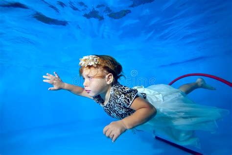 Little Girl Swimming Underwater Dress Stock Photos - Free & Royalty ...