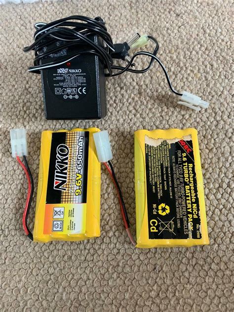 2x Nikko 96v 650mah Battery Packs With Charger F626 Yellow Remote Control Car In