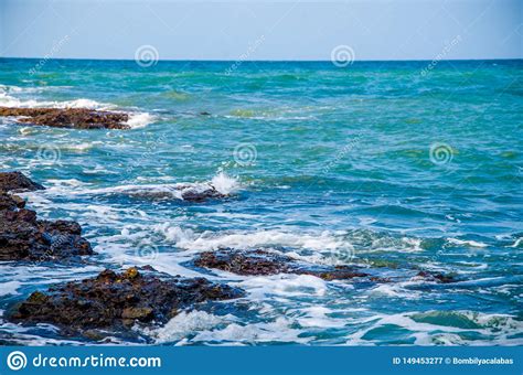 Ocean Waves Breaking on the Rocks on the Shore. Stock Image - Image of ...