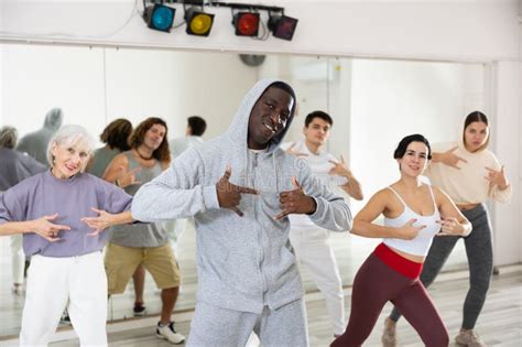 African American Man Practicing Hip-hop Movements during Group Class ...