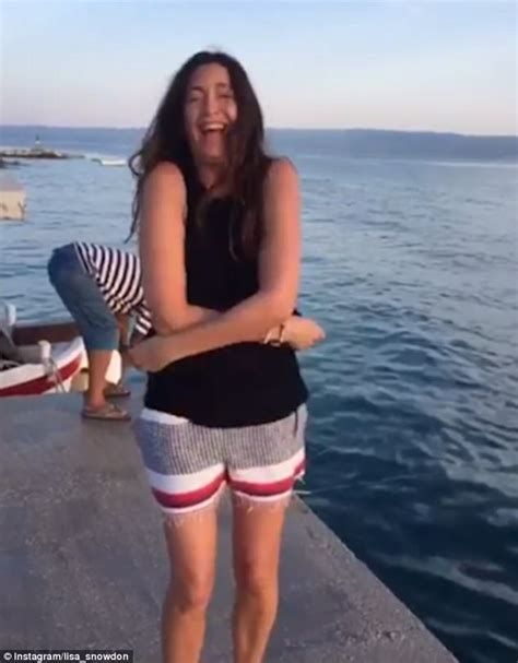 Lisa Snowdon Flaunts Her Abs In A Tiny Black Bikini Daily Mail Online