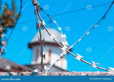 Prison barbed wire stock photo. Image of equipment, prison - 213208194