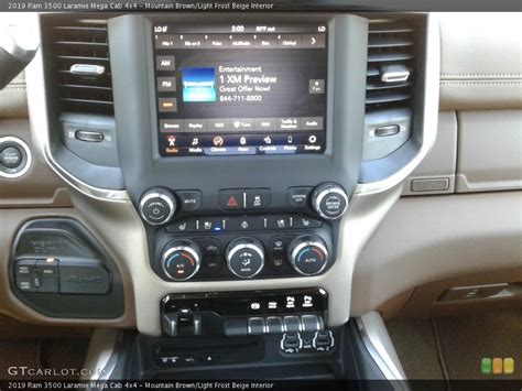 Mountain Brown Light Frost Beige Interior Controls For The 2019 Ram