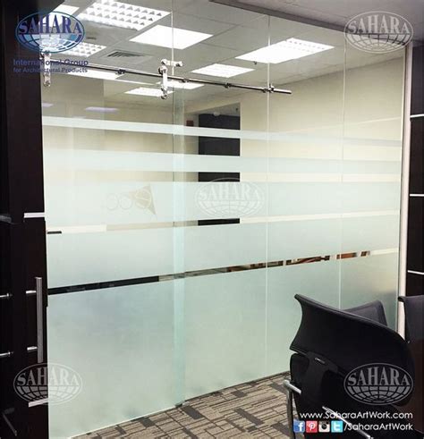 Office Sliding Door And Partitions Made From Clear Glass And Frosted