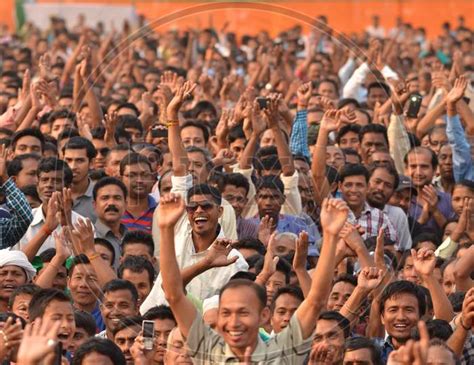 Image Of Crowd Of Young Indian Cheering And Recording With Smartphones