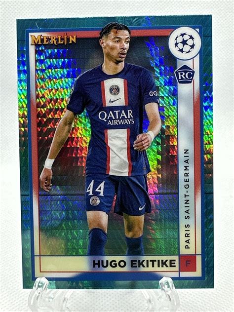 2022 23 Topps Merlin Chrome 100 Hugo Ekitike RC Aqua Prism Refractor