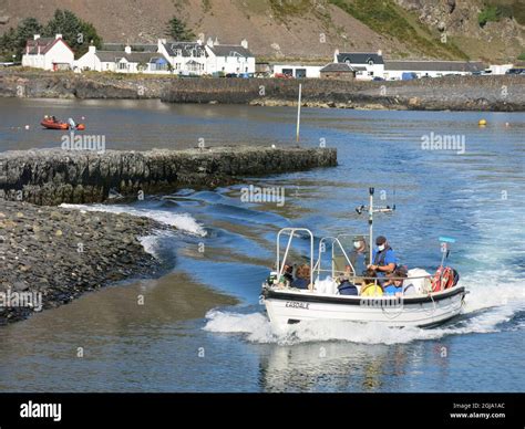 It's just a 5 minute ferry crossing from Ellenabeich on the Isle of Seil to the neighbouring ...