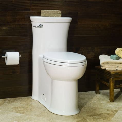Tropic® One-Piece 1.28 gpf/4.8 Lpf Chair Height Elongated Toilet With