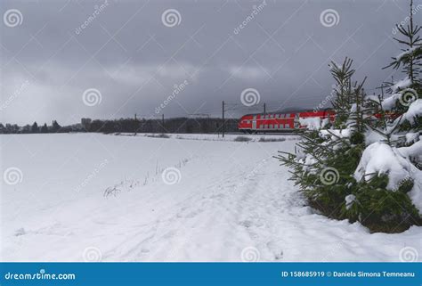 Winter Landscape with Snowy Fields and Red Train Stock Image - Image of cloudy, rail: 158685919