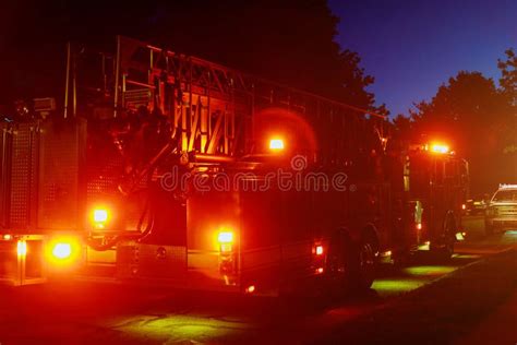 Fire Truck with Flashing Lights, Lighting in Dusk Stock Photo - Image of street, traffic: 188927006