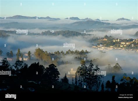 Sunrise at Ooty mountain station valley in Southern India Stock Photo ...