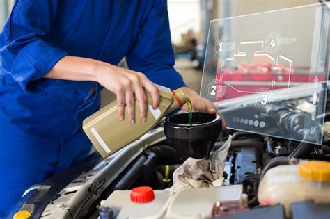 Premium Photo Engine Interface Against Mechanic Pouring Oil Into Car