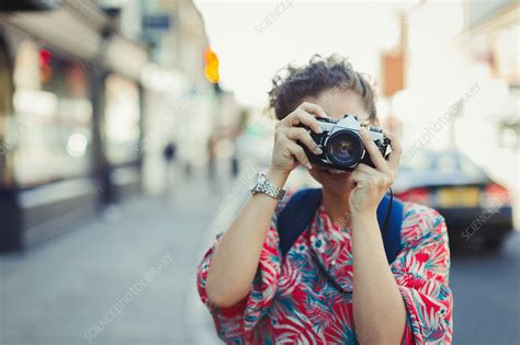 Portrait Woman Photographing With Camera On Street Stock Image F020