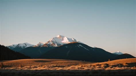 Premium AI Image | A mountain range with a blue sky and a white cloud