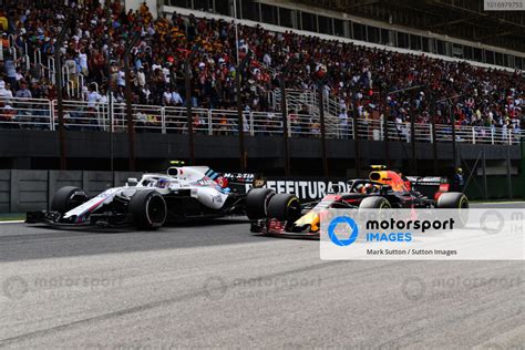 Sergey Sirotkin Williams Fw41 And Max Verstappen Red Bull Racing Rb14 Battle Brazilian Gp