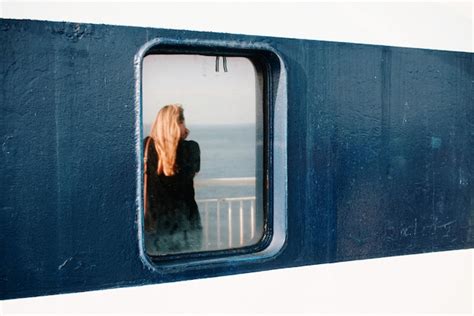 Premium Photo | Reflection of woman on train window