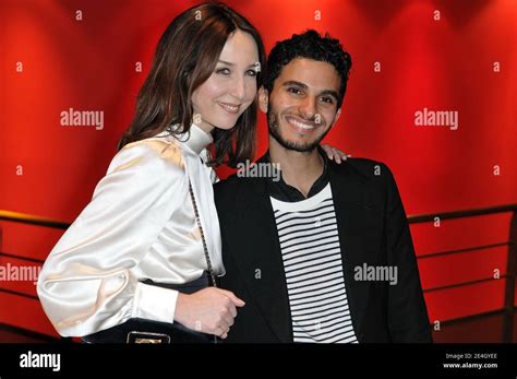 Actress Elsa Zylberstein And Actor Mehdi Dehbi Poses During La Folle