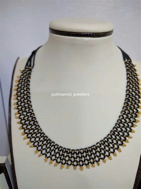 Pin By Navya Ayyanagari On Beads Jewellery Black Beaded Jewelry Gold