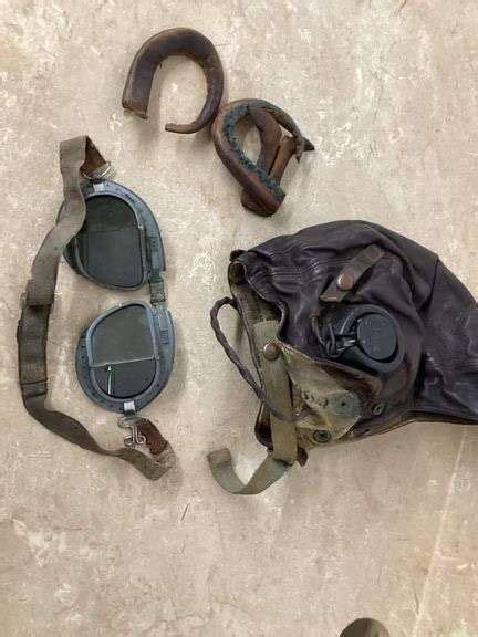 VINTAGE LEATHER PILOT HELMET AND GOGGLES - Currie Auction Service