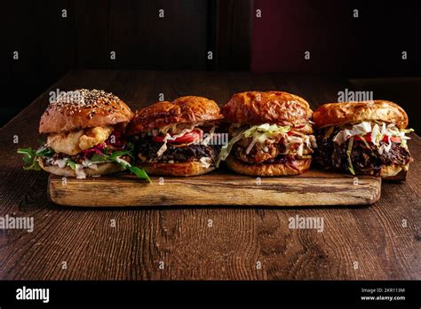 types  burgers   wooden board stock photo alamy