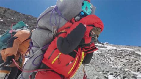 Sherpa carries Malaysian climber to safety in 'very rare' high-altitude ...