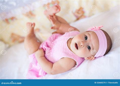 Cute Baby Girl in a Pink Dress Stock Photo - Image of portrait, looking ...