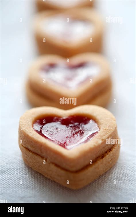 Row Of Heart Shaped Jam Tarts Stock Photo Alamy