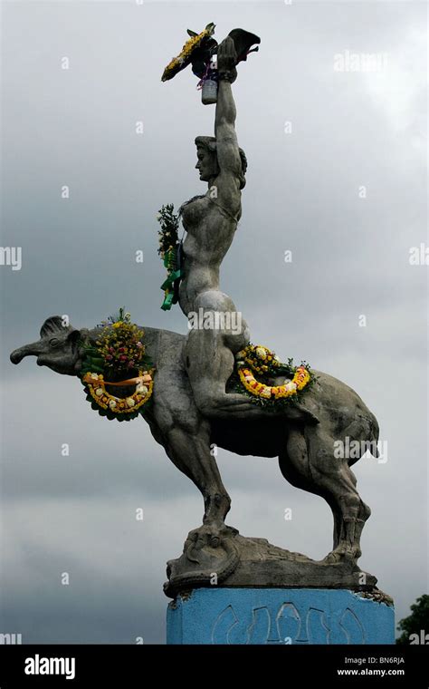 A statue of Venezuela's highest Santeria goddess Maria Lionza overlooks ...