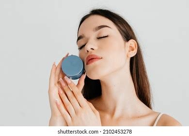 Portrait Pleased Woman Bare Shoulders Holding Stock Photo