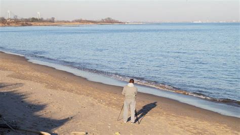 Photographer on the Beach at Great Kills, Staten Island, NY Editorial ...