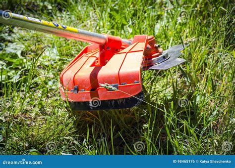 Mowing the grass stock photo. Image of streaming, open - 98465176